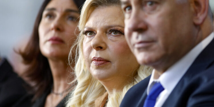 (FILES) Israeli Prime Minister Benjamin Netanyahu and his wife Sara attend an event in the occupied-West Bank town of Hebron on September 4, 2019. A criminal investigation has been launched into Sara Netanyahu, the office of Israel's state attorney said on February 2, 2025. (Photo by Menahem KAHANA / AFP)