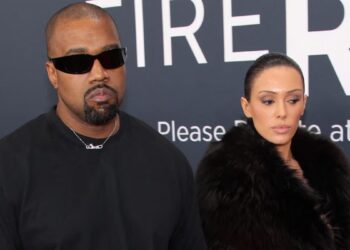 Kanye West Grammys, Kanye Invisible dress, Kanye West Bianca Censori, Bianca Censori dress, Bianca Censori Grammys, Kanye West wife dress theGrio.com
© Photo by Frazer Harrison/Getty Images