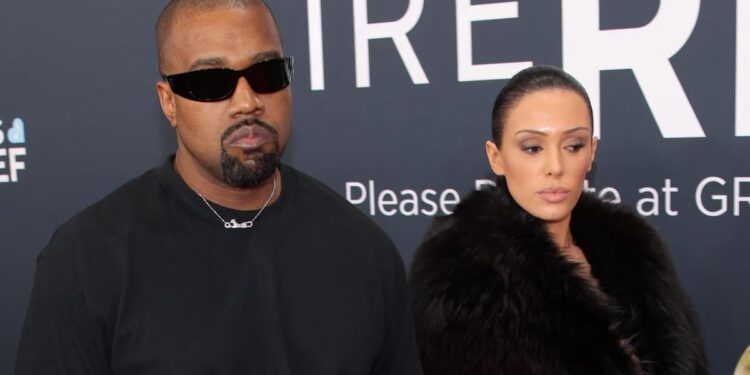 Kanye West Grammys, Kanye Invisible dress, Kanye West Bianca Censori, Bianca Censori dress, Bianca Censori Grammys, Kanye West wife dress theGrio.com
© Photo by Frazer Harrison/Getty Images