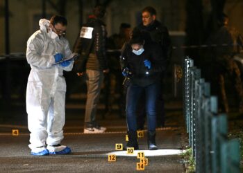 French forensic police work on the site of a knife attack where a man is suspected of killing one person and seriously wounding two police officers in Mulhouse, eastern France on February 22, 2025. Prosecutors said three more officers were lightly wounded in the attack in the city of Mulhouse, carried out by a 37-year-old suspect who is on a terror prevention watchlist, prosecutor told AFP. (Photo by SEBASTIEN BOZON / AFP)